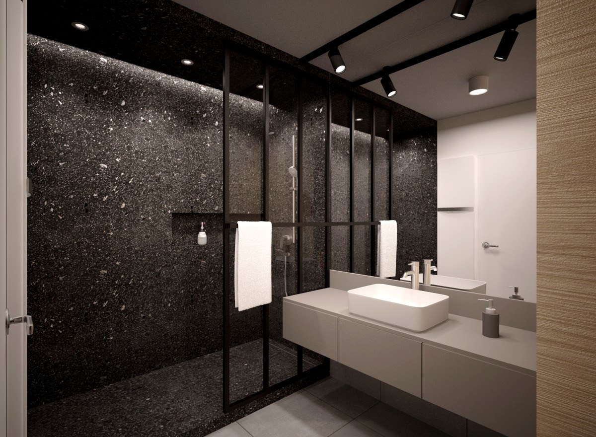 Ciemny kolor pojawił się również w łazience, wyznaczając strefę prysznica.